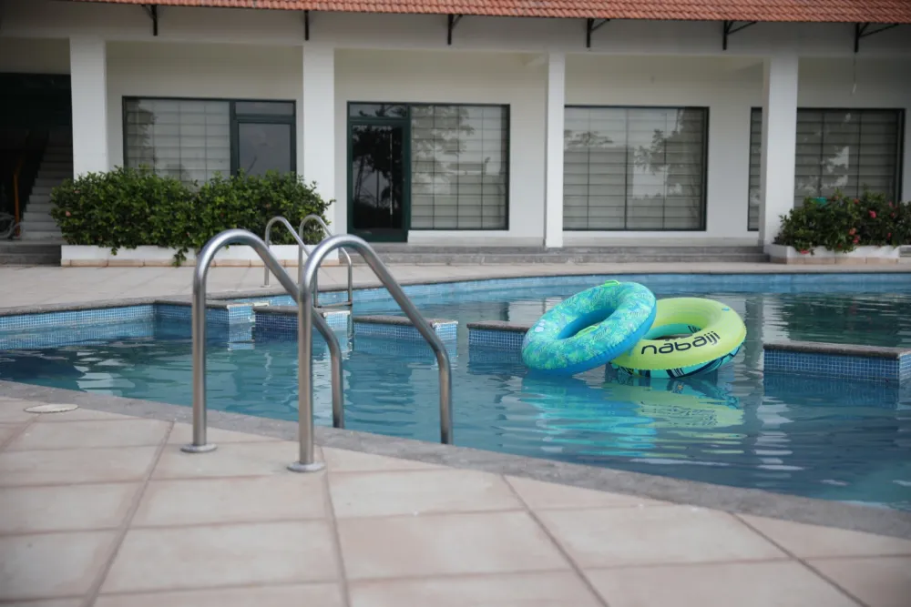 The swimming pool, with the floats left in it.